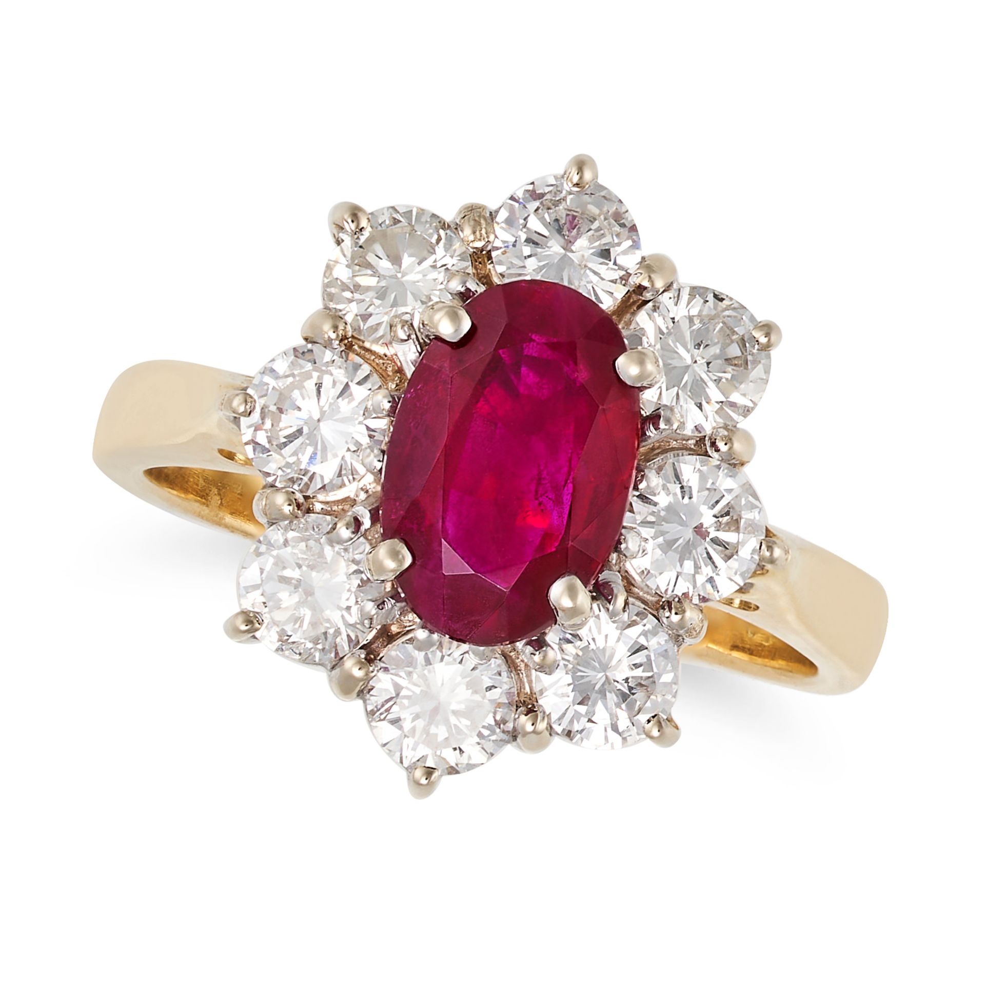 A RUBY AND DIAMOND CLUSTER RING in 18ct yellow gold, set with an oval cut ruby of approximately 1...