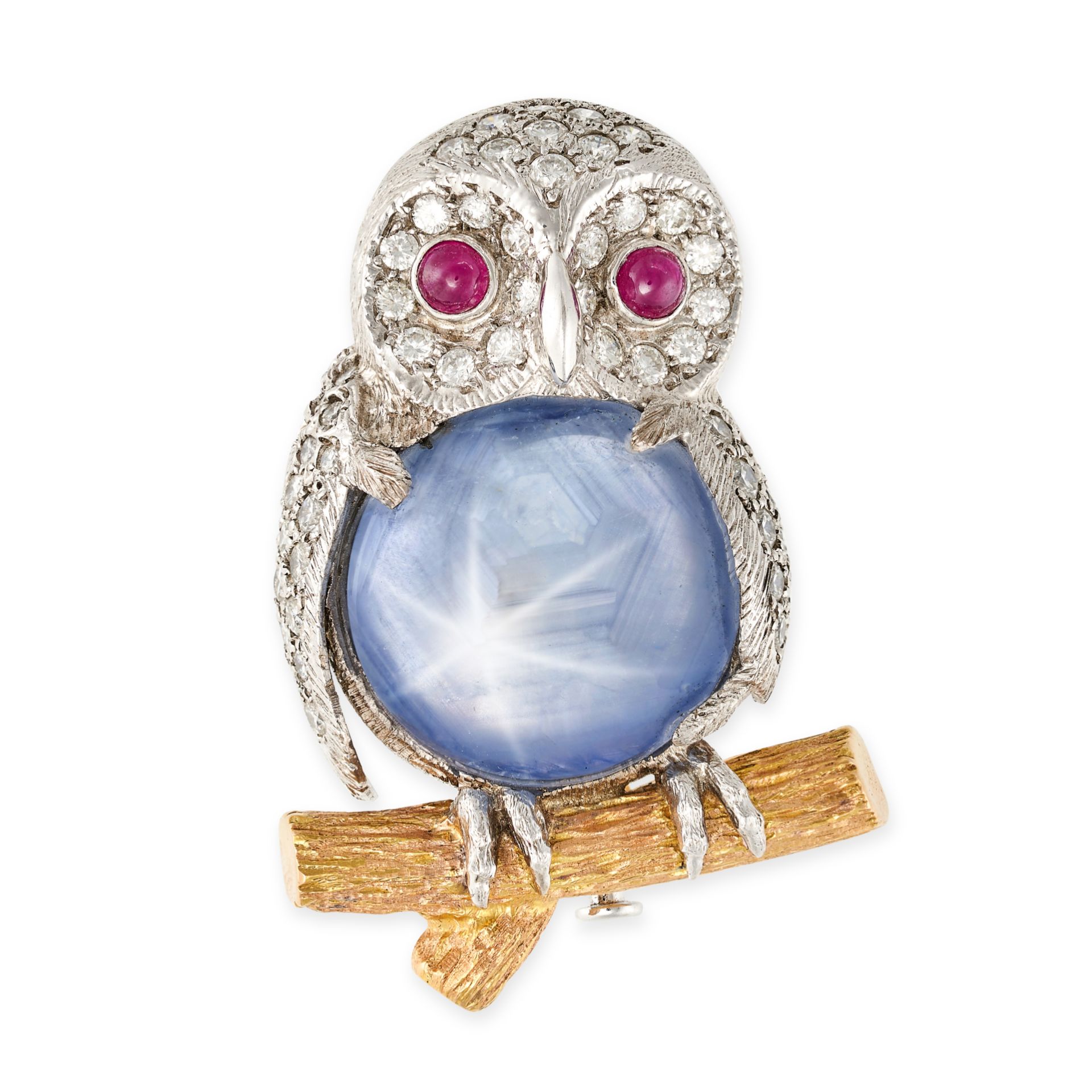 A VINTAGE STAR SAPPHIRE, RUBY, AND DIAMOND OWL BROOCH in yellow and white gold, designed as an ow...