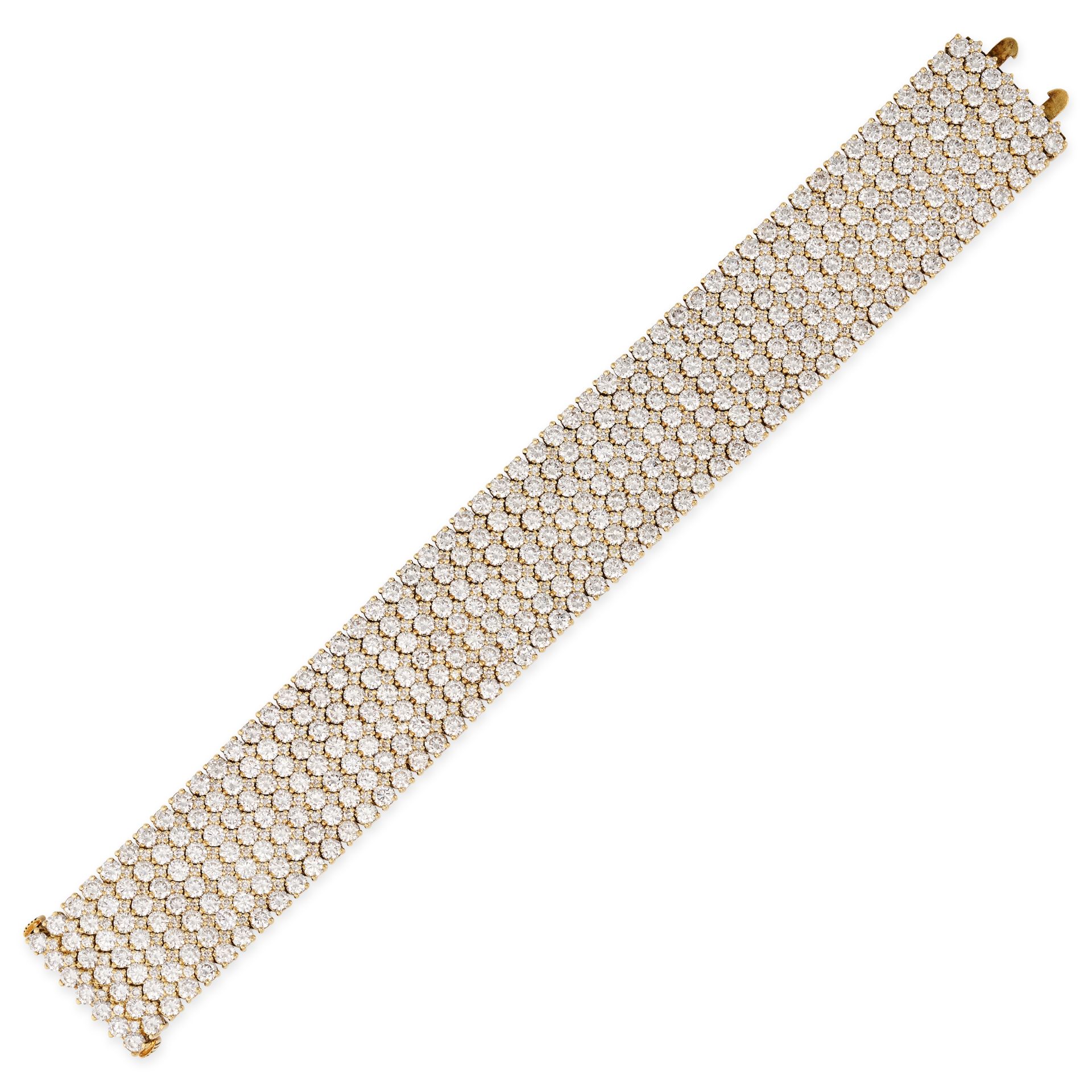 A 37.50 CARAT DIAMOND BRACELET in 18ct yellow gold, set with seven rows of round brilliant cut di...