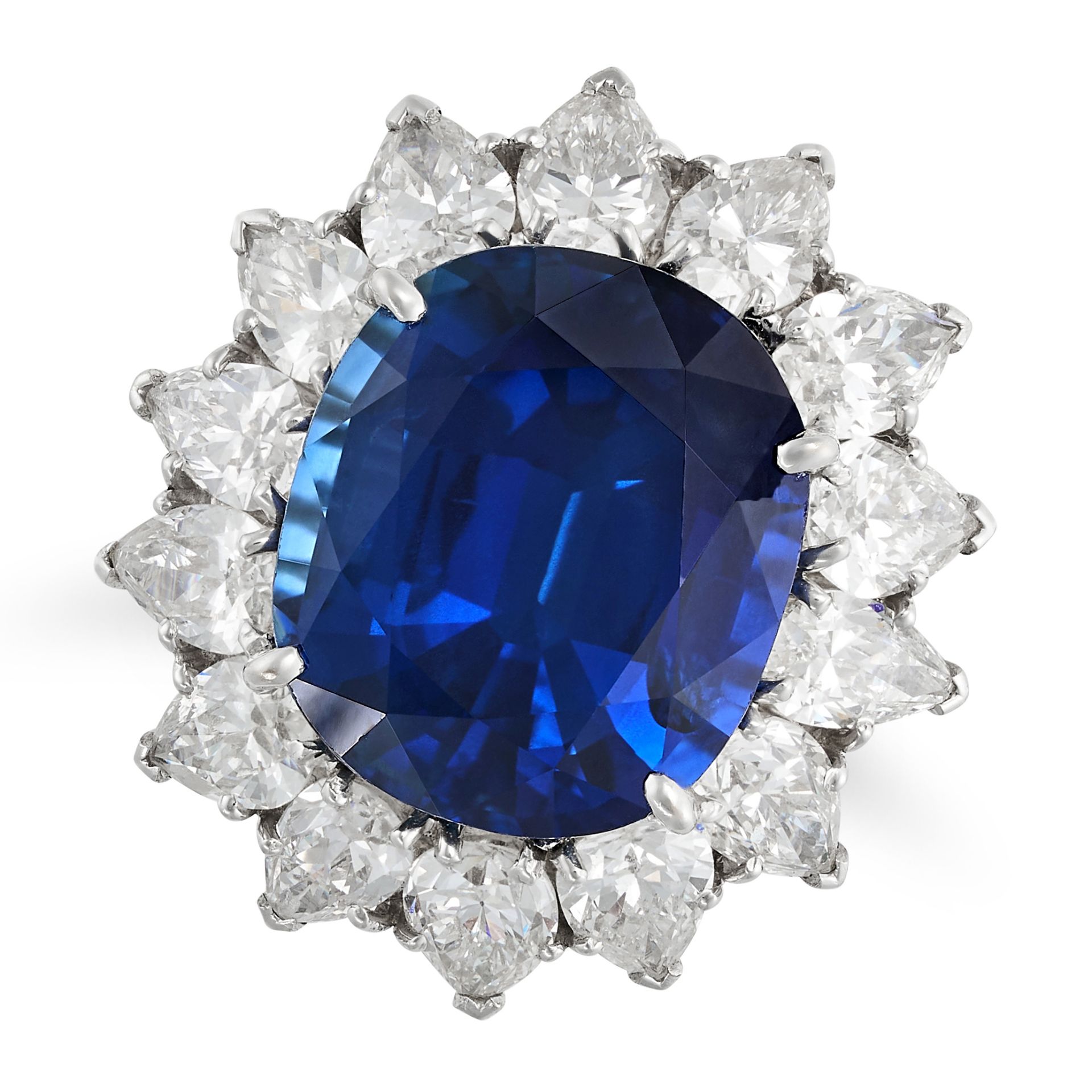 A FINE UNHEATED SAPPHIRE AND DIAMOND CLUSTER RING in 18ct white gold, set with a cushion cut sapp...