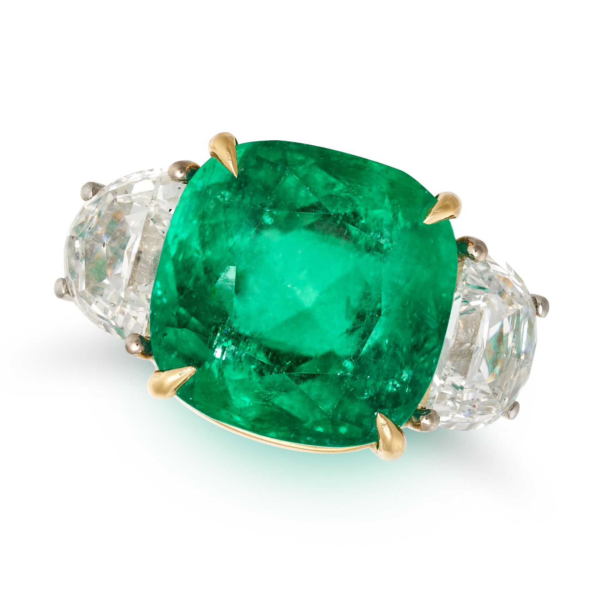 A COLOMBIAN EMERALD AND DIAMOND RING in 18ct white and yellow gold, set with a cushion cut emeral...