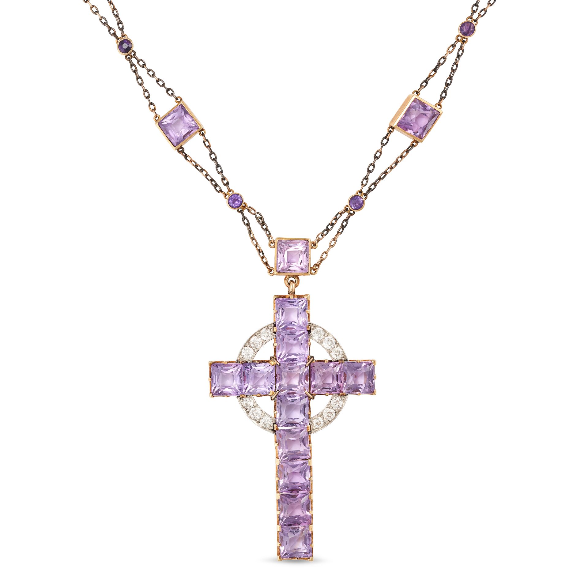 AN ANTIQUE AMETHYST AND DIAMOND CROSS PENDANT NECKLACE, EARLY 20TH CENTURY in yellow gold and sil...