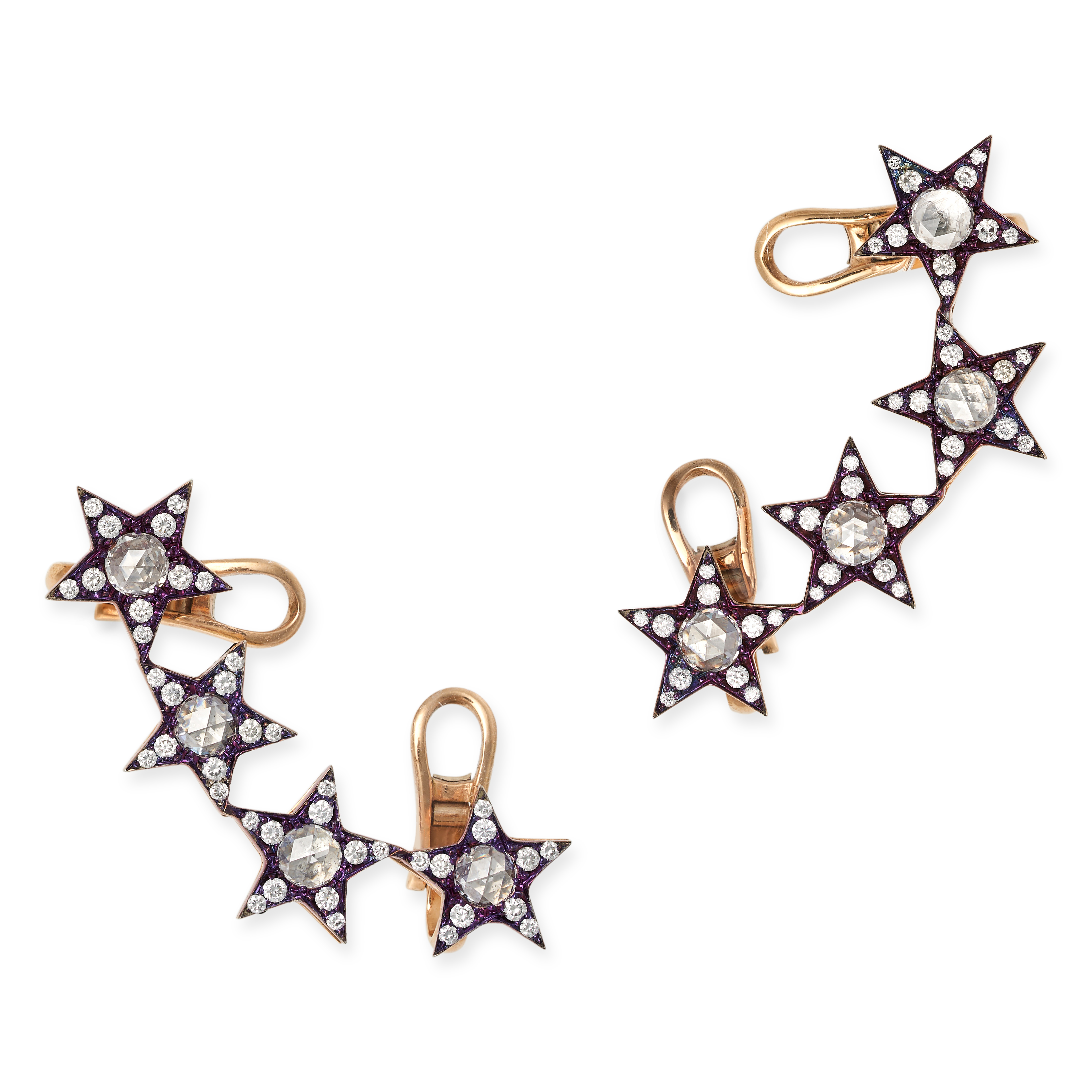 A PAIR OF DIAMOND STAR CUFF EARRINGS in 18ct yellow gold, each designed as a curved row of four s...