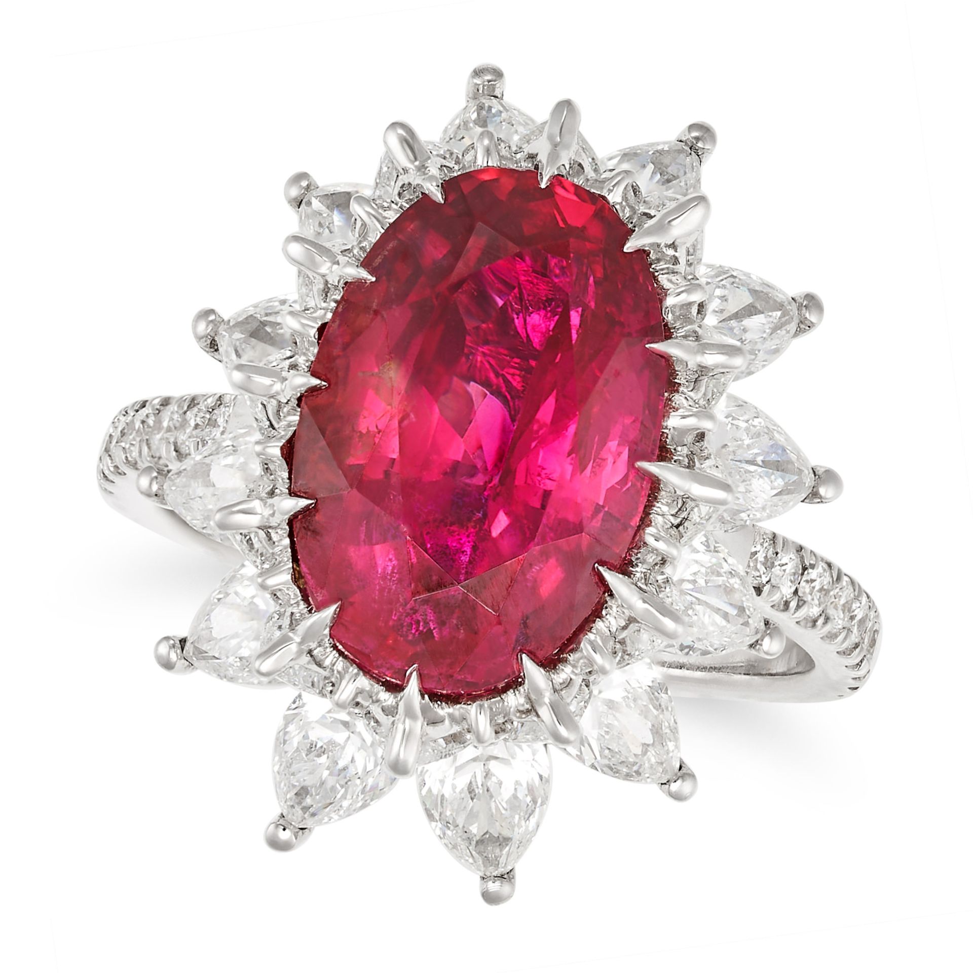 A BURMA NO HEAT RUBY AND DIAMOND CLUSTER RING in 18ct white gold, set with an oval cut ruby of 6....