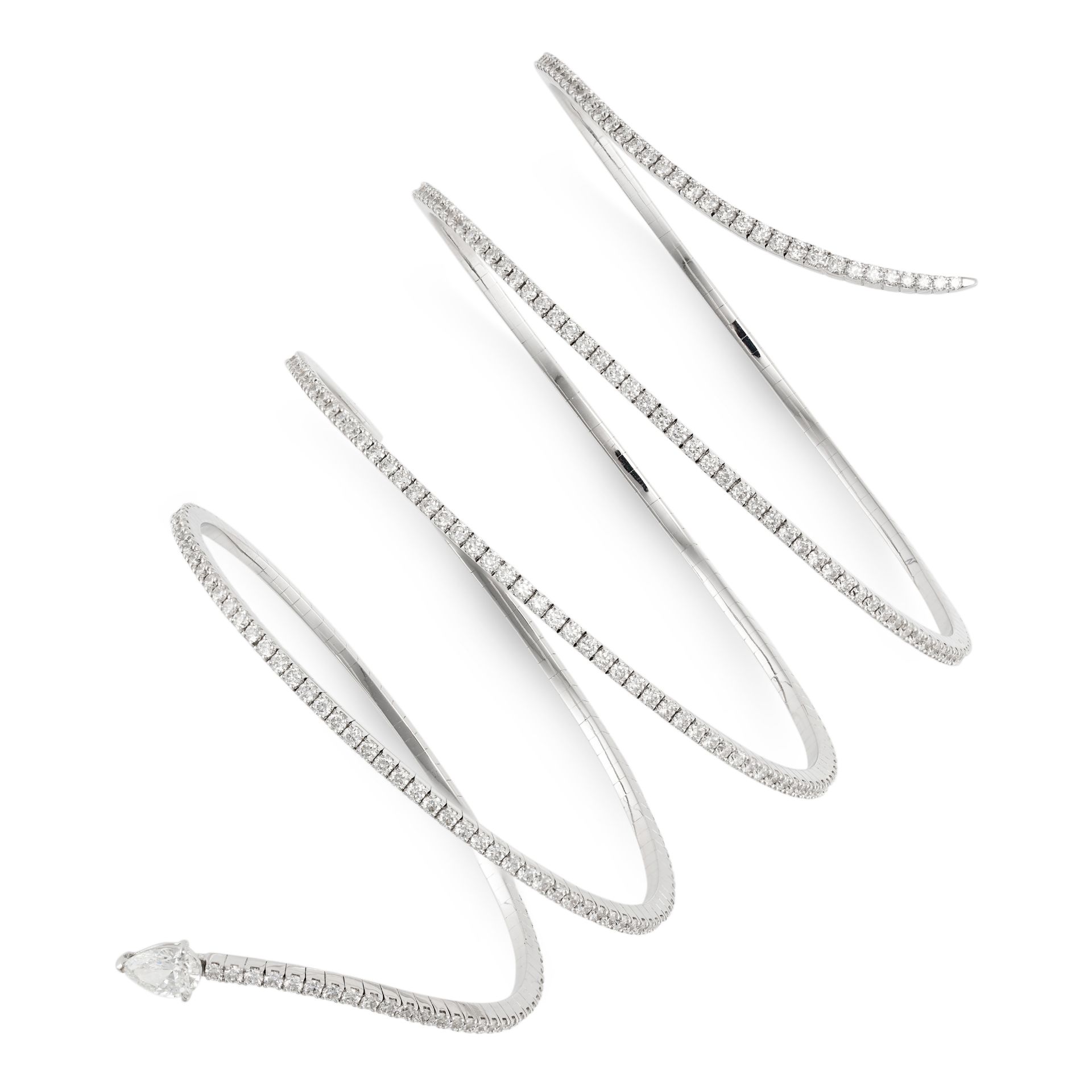 MESSIKA, A DIAMOND SKINNY SNAKE BRACELET in 18ct white gold, designed as a coiled snake, the head...