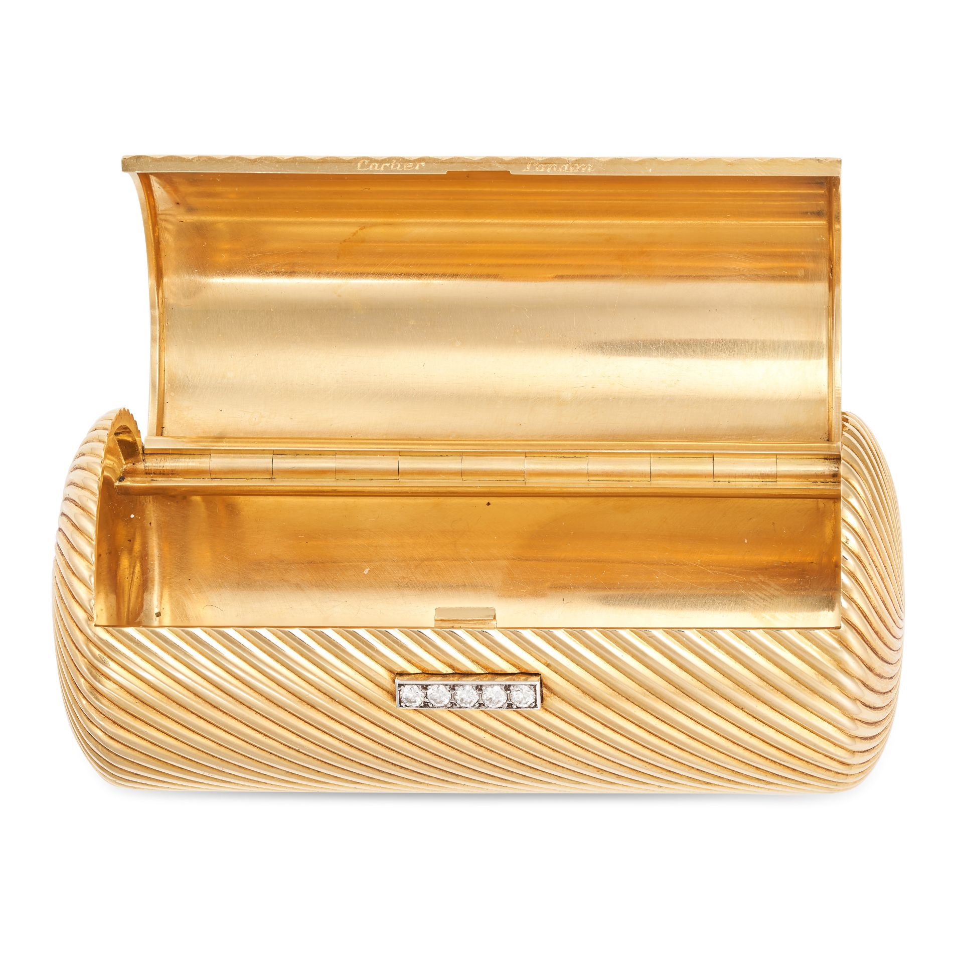 CARTIER, A VINTAGE DIAMOND CIGARETTE CASE, 1954 in 18ct yellow gold, the cylindrical fluted body ...