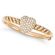AN ANTIQUE PEARL HEART BANGLE in yellow gold, the hinged bangle with a heart motif pave set with ...