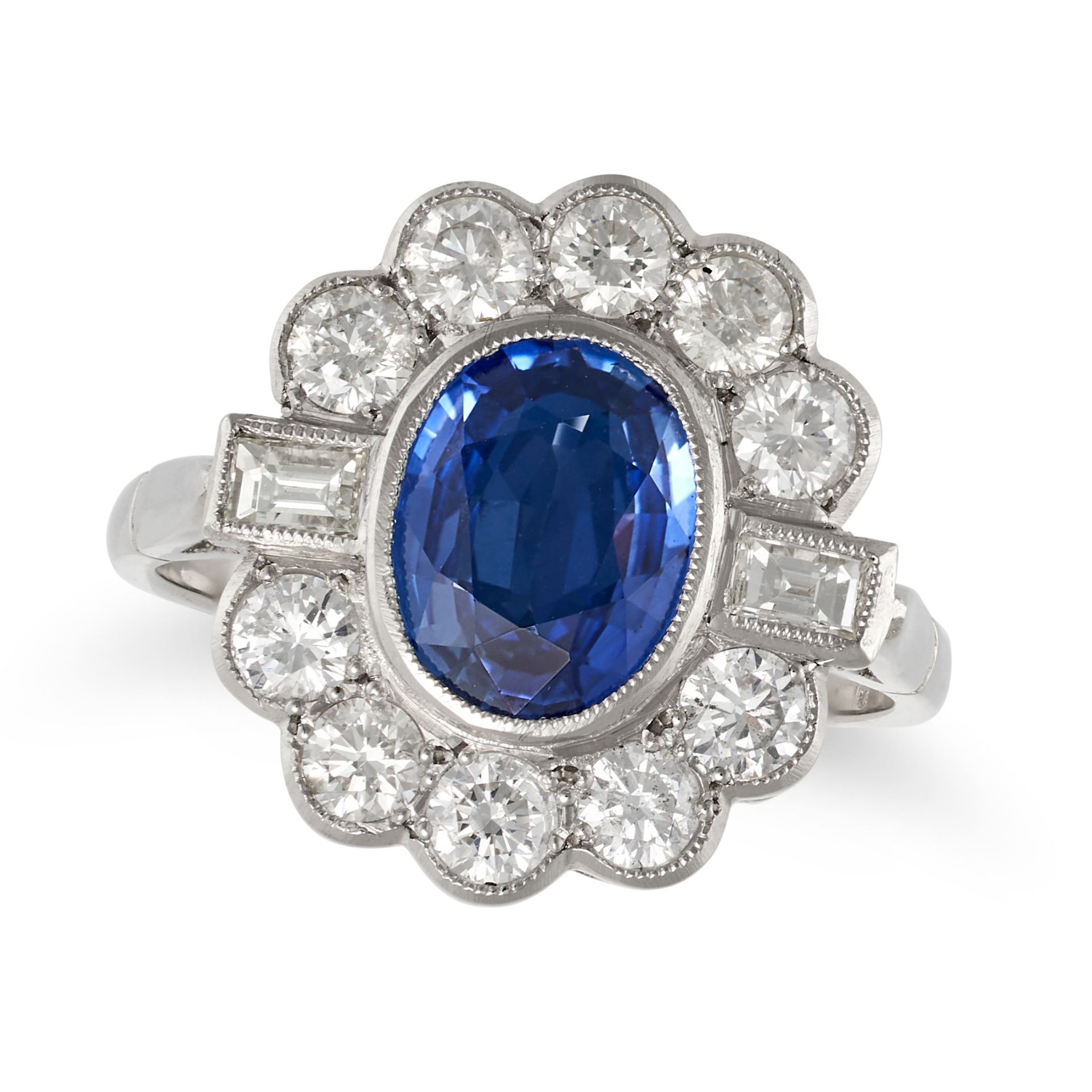 A SAPPHIRE AND DIAMOND CLUSTER RING in platinum, set with an oval cut sapphire of approximately 1...