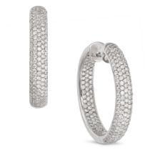 A PAIR OF DIAMOND HOOP EARRINGS in 14ct white gold, each designed as a hoop pave set inside and o...
