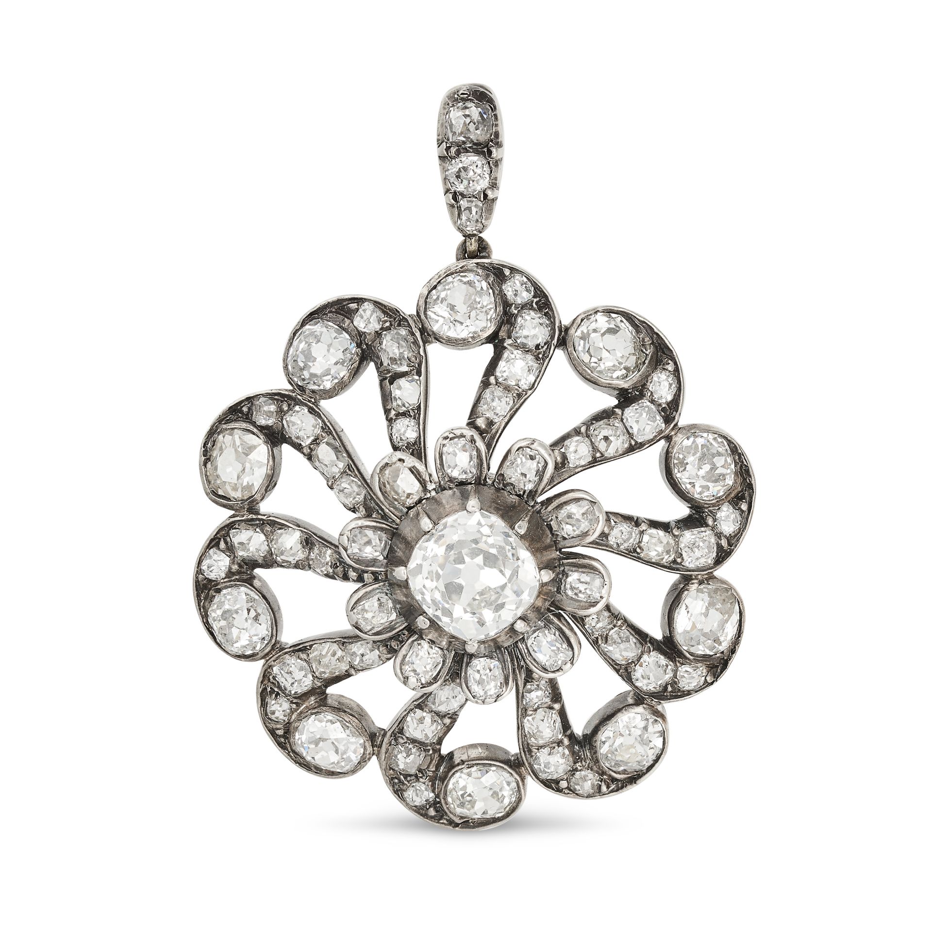 AN ANTIQUE DIAMOND SNOWFLAKE PENDANT in yellow gold and silver, set to the centre with an old cut...