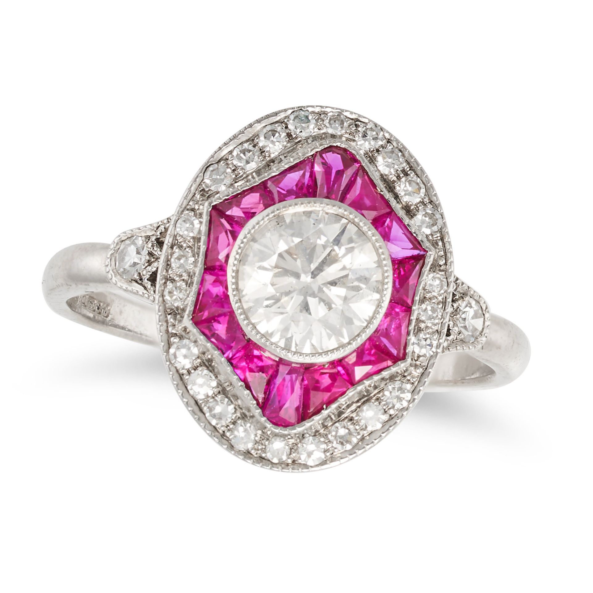 NO RESERVE - A RUBY AND DIAMOND TARGET RING in 18ct white gold, set with a round brilliant cut di...