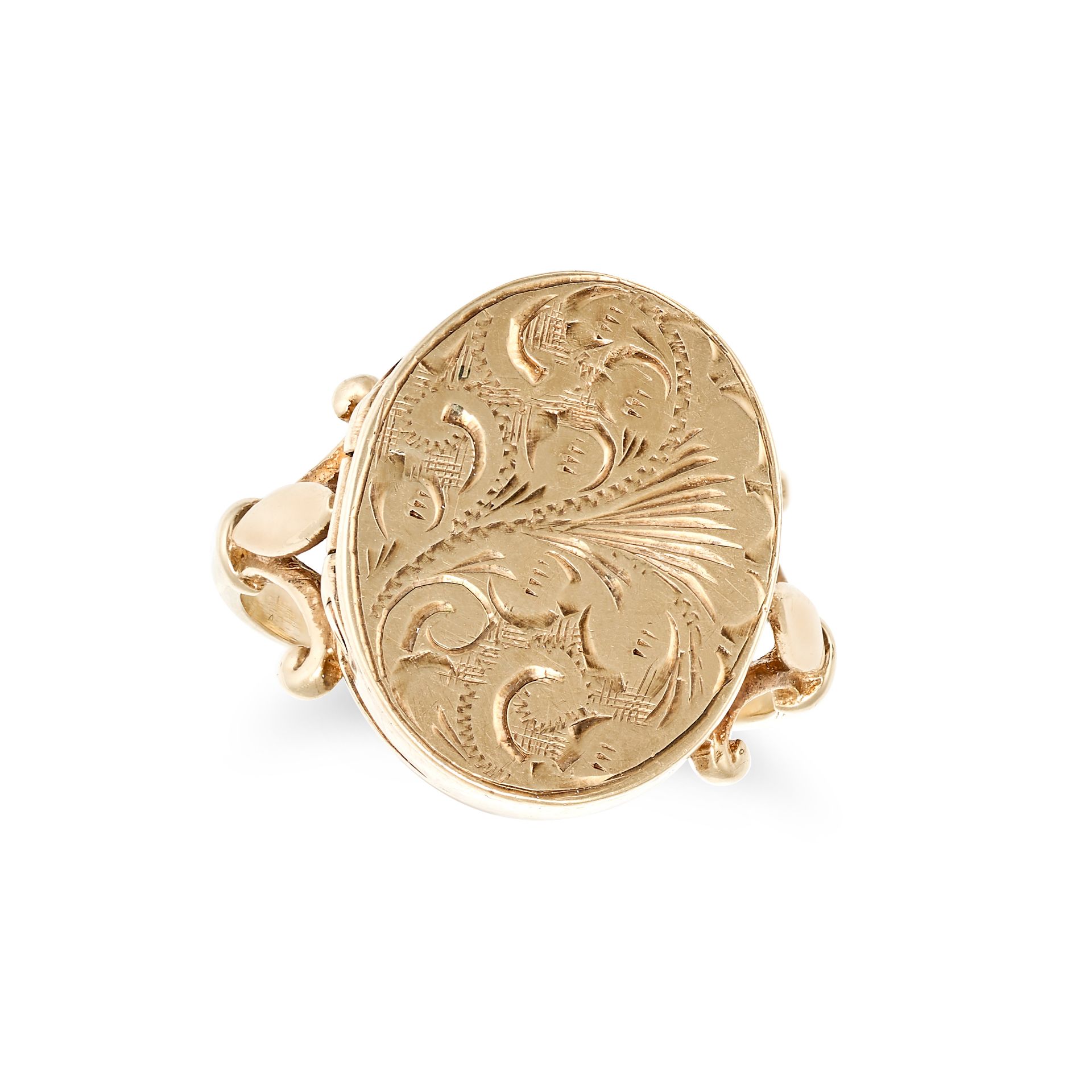 A POISON RING in yellow gold, the hinged lid engraved with a scrolling design and opening to reve...