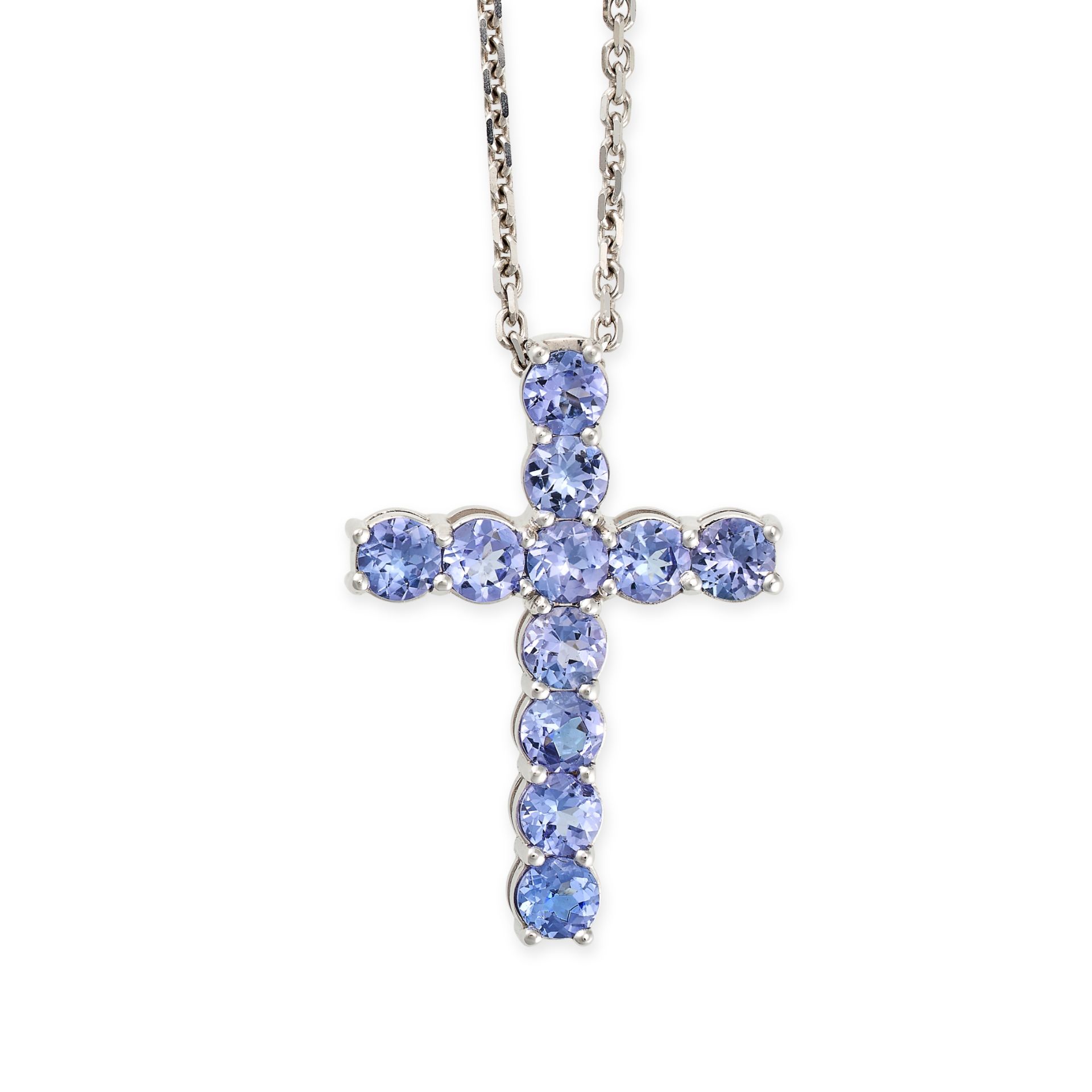 A TANZANITE CROSS PENDANT NECKLACE in 14ct white gold, designed as a cross set throughout with ro...