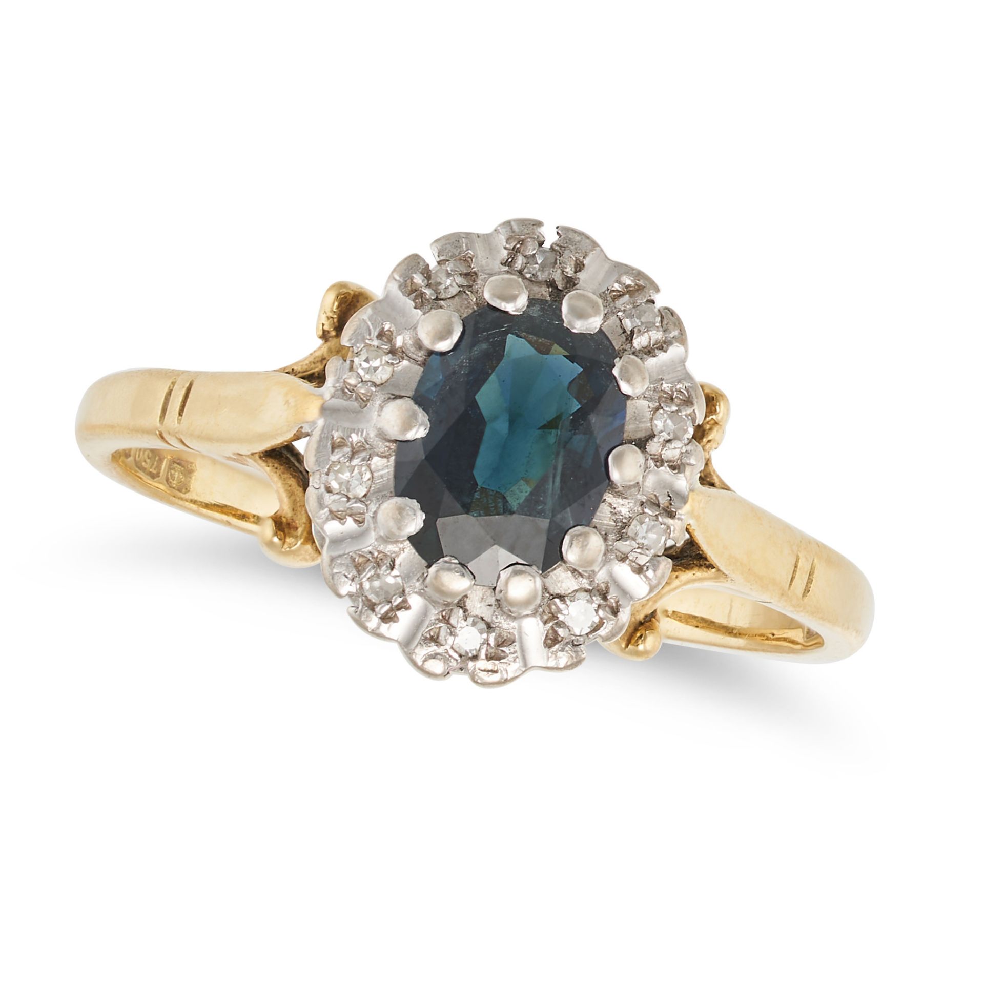 NO RESERVE - A SAPPHIRE AND DIAMOND CLUSTER RING in 18ct yellow gold, set with an oval cut sapphi...