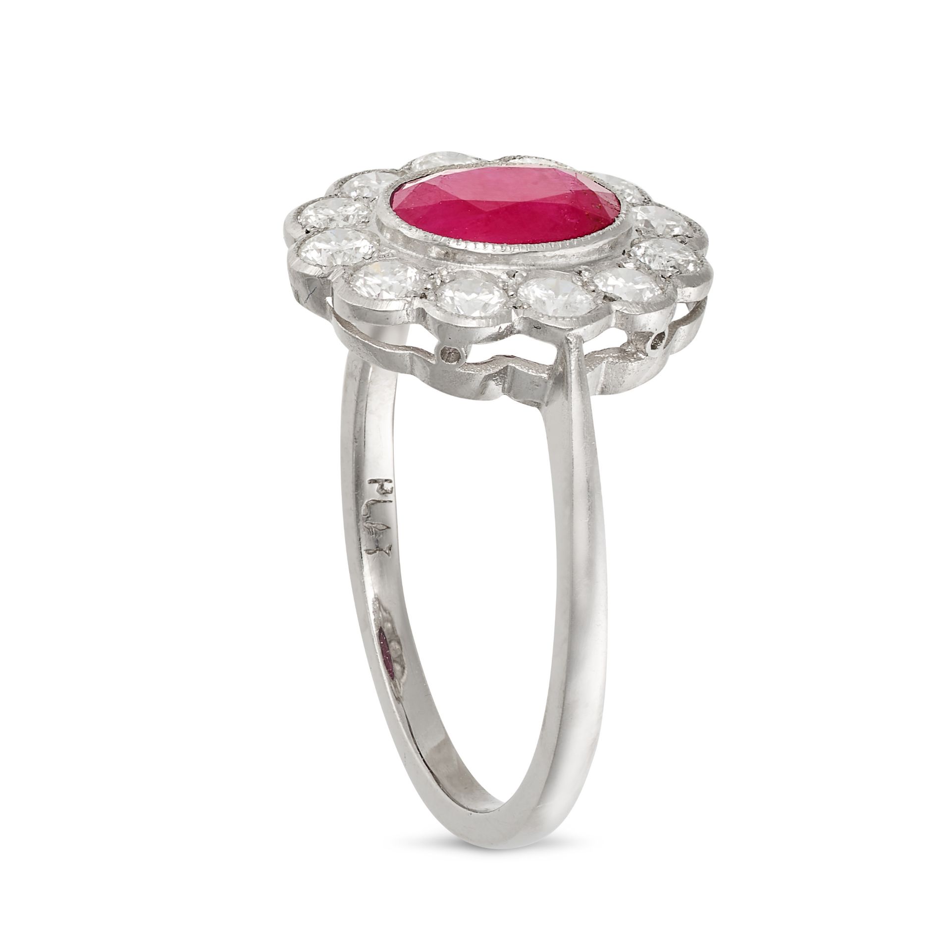 NO RESERVE - A RUBY AND DIAMOND CLUSTER RING in platinum, set with an oval cut ruby of approximat... - Image 2 of 2