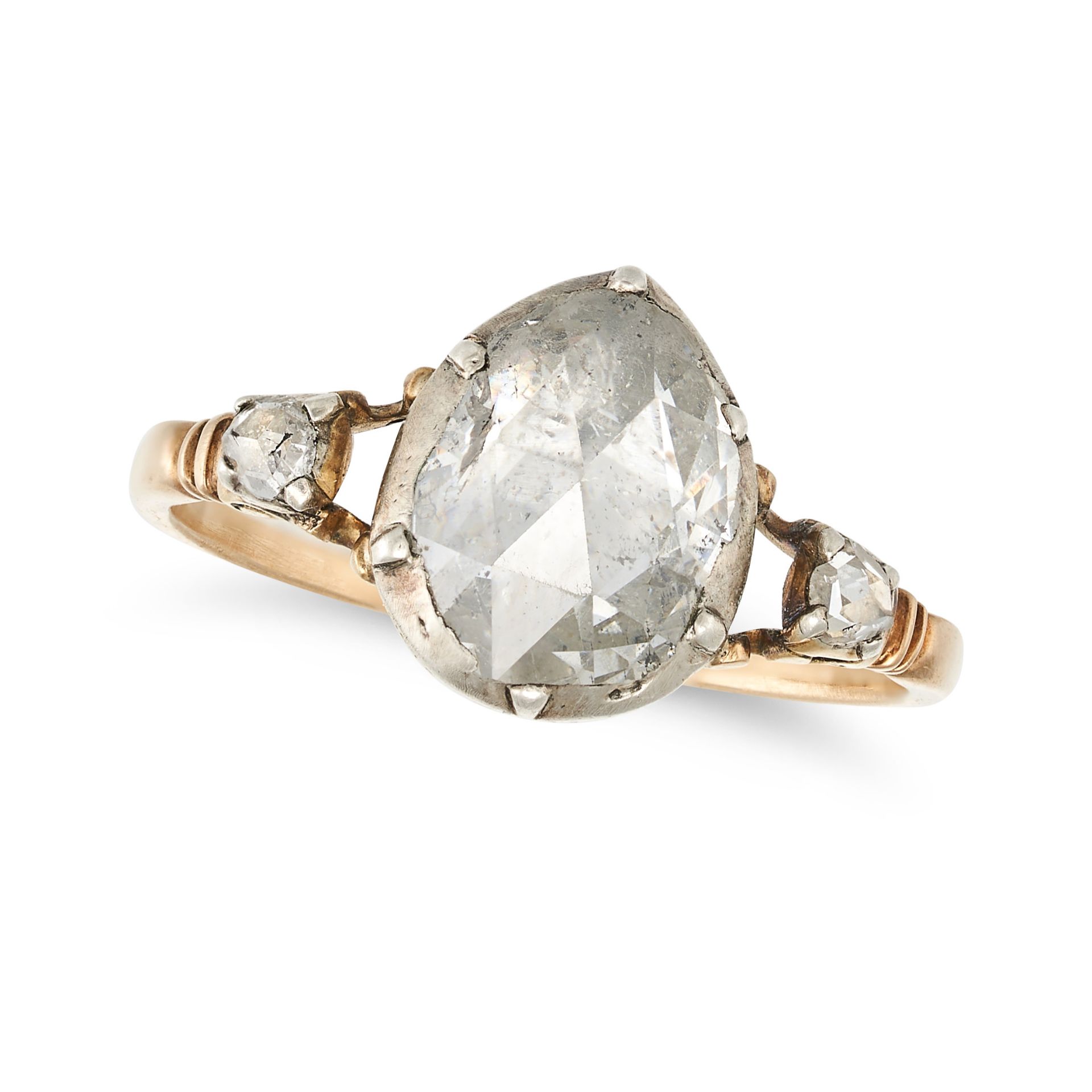 AN ANTIQUE GEORGIAN DIAMOND RING in yellow gold and silver, set with a pear-shaped rose cut diamo...