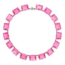A VINTAGE PINK PASTE RIVIERE NECKLACE in silver, comprising a row of seventeen rectangular step c...