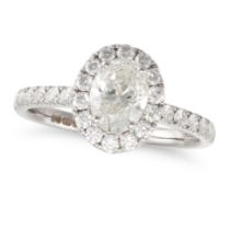 NO RESERVE - A DIAMOND HALO ENGAGEMENT RING in 18ct white gold, set with an oval cut diamond of 0...