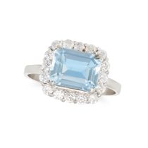 AN AQUAMARINE AND DIAMOND CLUSTER RING in platinum, set with an octagonal step cut aquamarine of ...