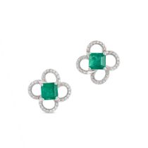 A PAIR OF EMERALD AND DIAMOND STUD EARRINGS in 18ct white gold, each set with a square step cut e...