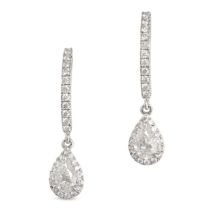 MESSIKA, A PAIR OF DIAMOND DROP EARRINGS in 18ct white gold, comprising a row of round brilliant ...
