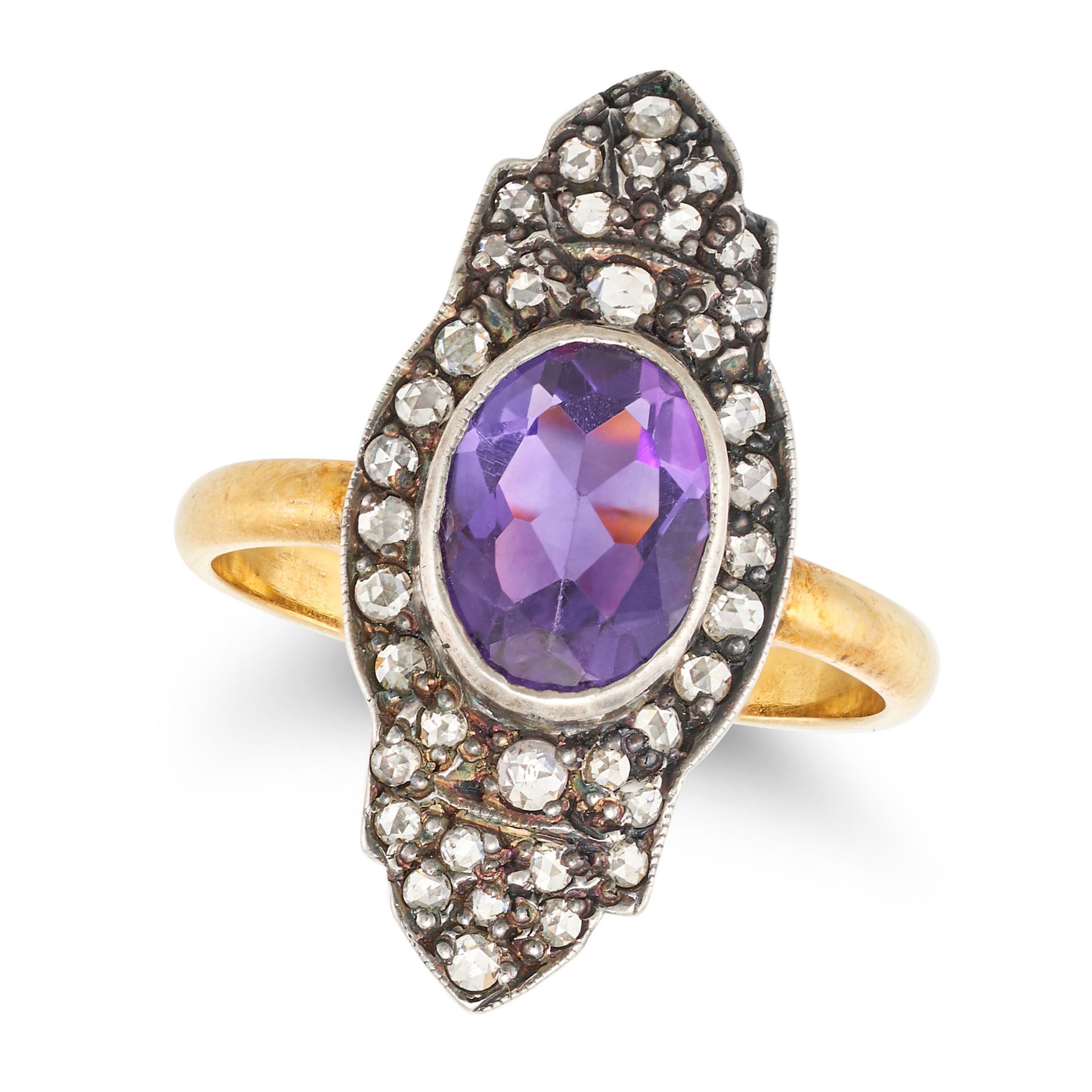 NO RESERVE - AN AMETHYST AND DIAMOND DRESS RING in yellow gold and silver, the elongated face set...