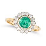NO RESERVE - AN EMERALD AND DIAMOND CLUSTER RING in 18ct yellow and white gold, set with a round ...