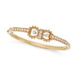 AN ANTIQUE DIAMOND AND PEARL BANGLE in yellow gold, the hinged bangle set with old cut diamonds w...