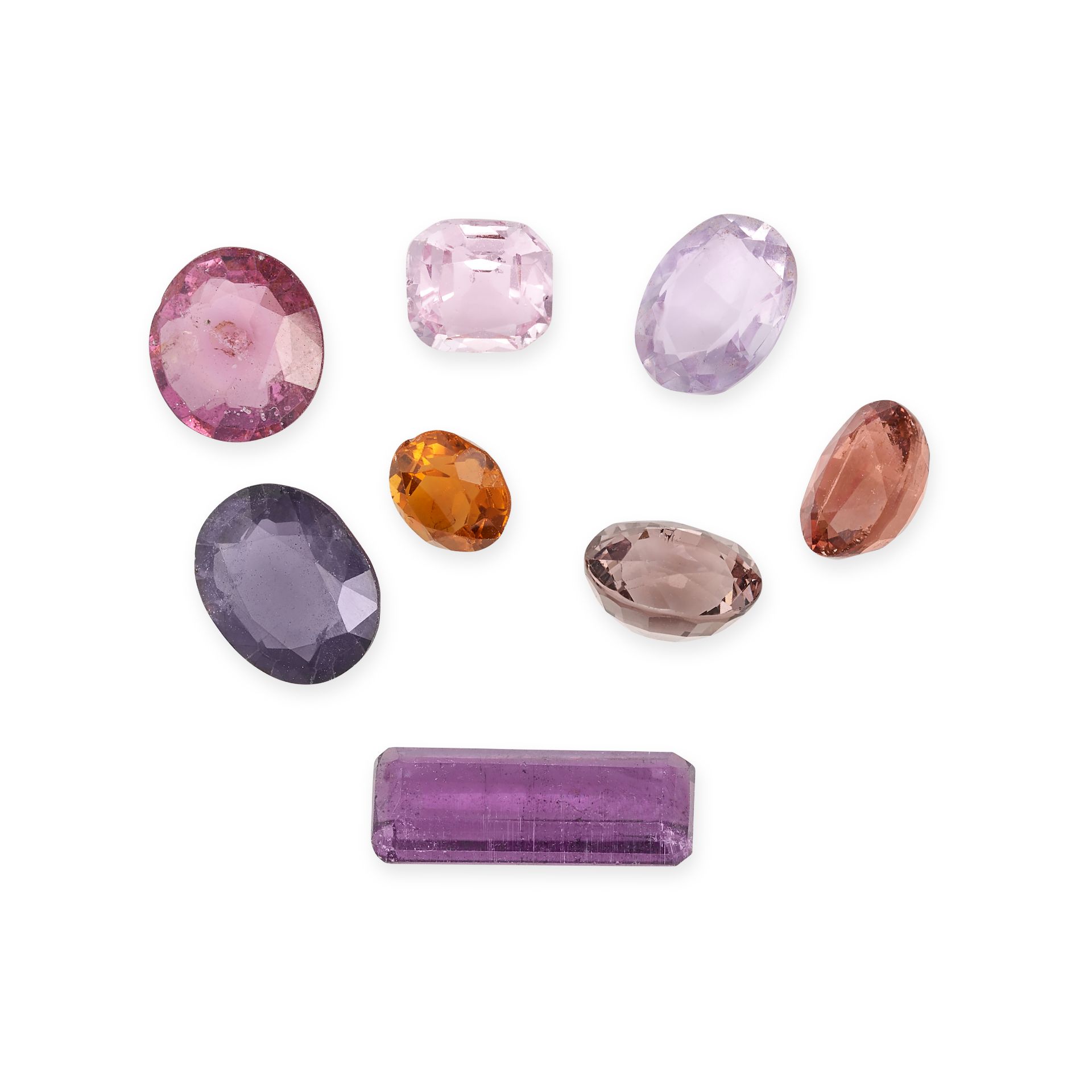 A MIXED LOT OF UNMOUNTED GEMSTONES comprising an oval mixed cut citrine of 36.13 carats, a mixed ...