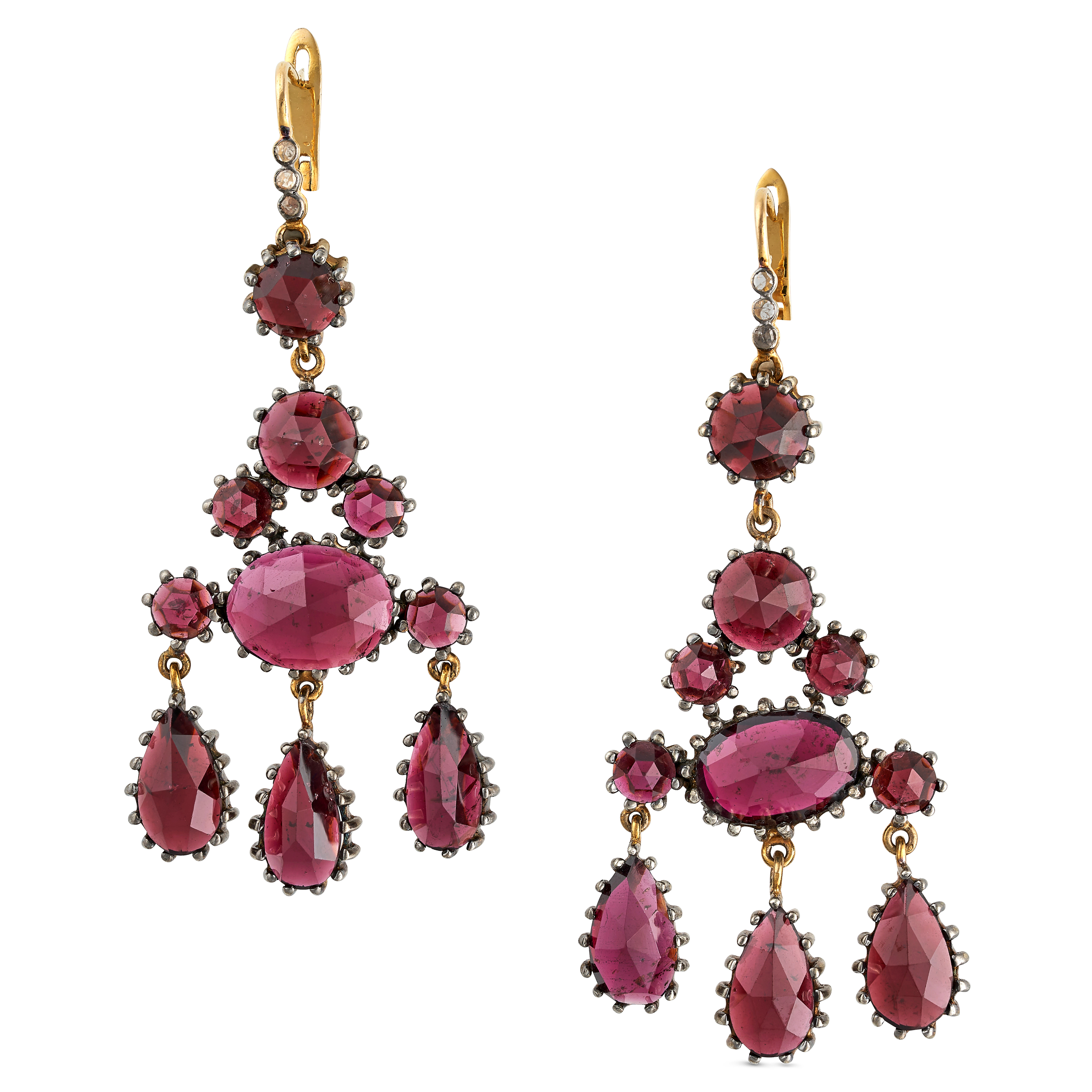 A PAIR OF GARNET GIRANDOLE EARRINGS in yellow gold and silver, each comprising a row of three ros...