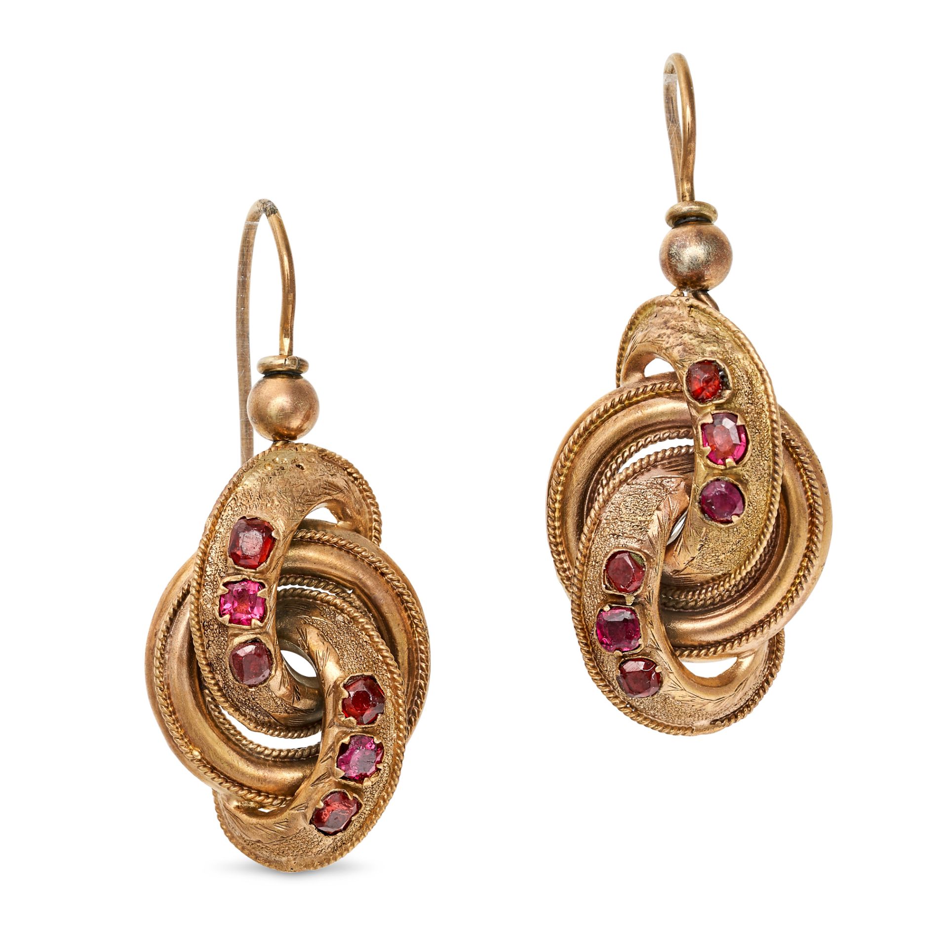 A PAIR OF ANTIQUE GARNET EARRINGS in yellow gold, in a knotted design set with cushion and round ...