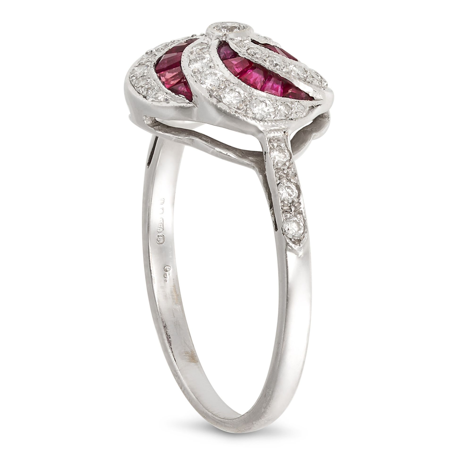 A RUBY AND DIAMOND DRESS RING in 18ct white gold, set with calibre cut rubies and round brilliant... - Bild 2 aus 2