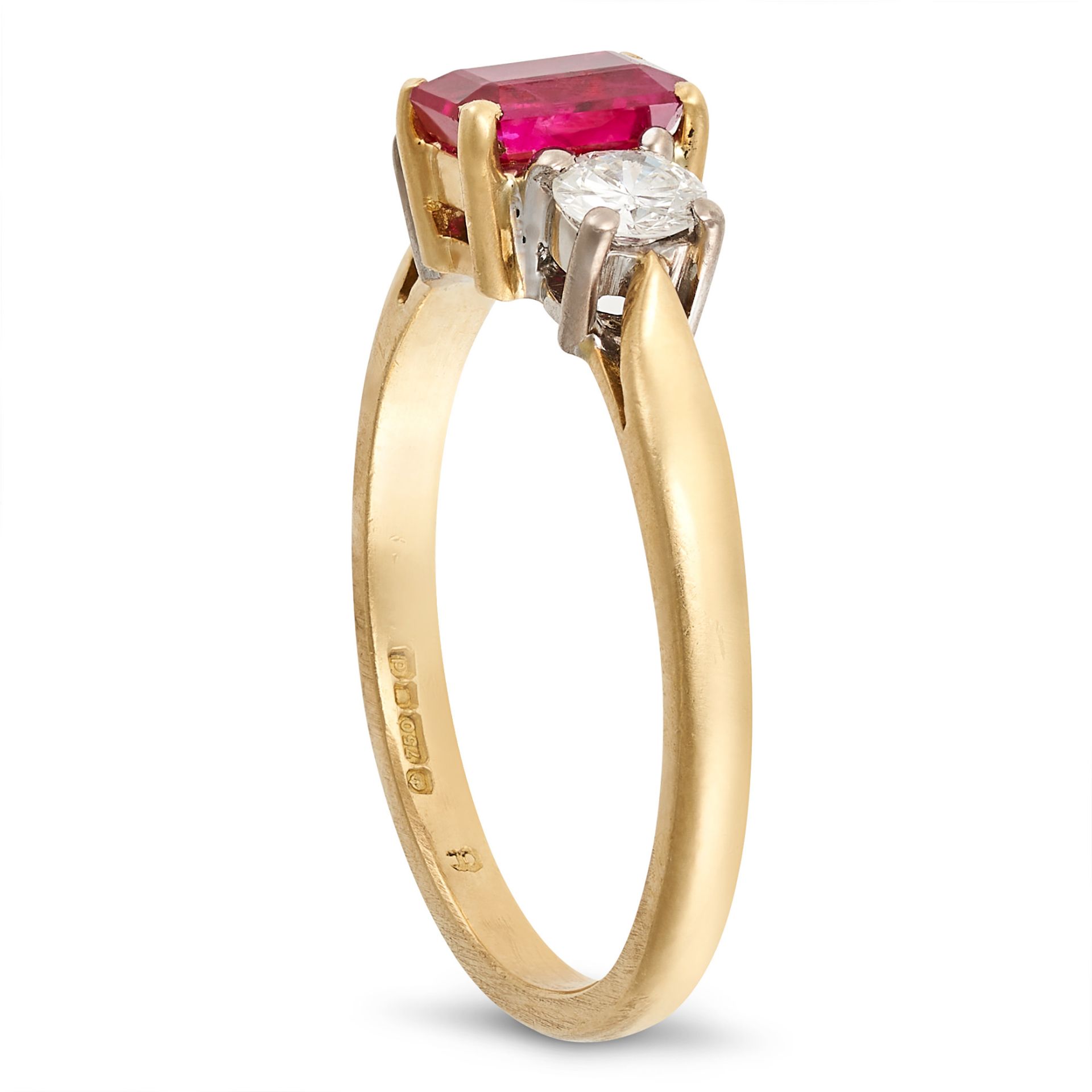 A RUBY AND DIAMOND THREE STONE RING in 18ct yellow gold, set with a rectangular step cut ruby bet... - Image 2 of 2