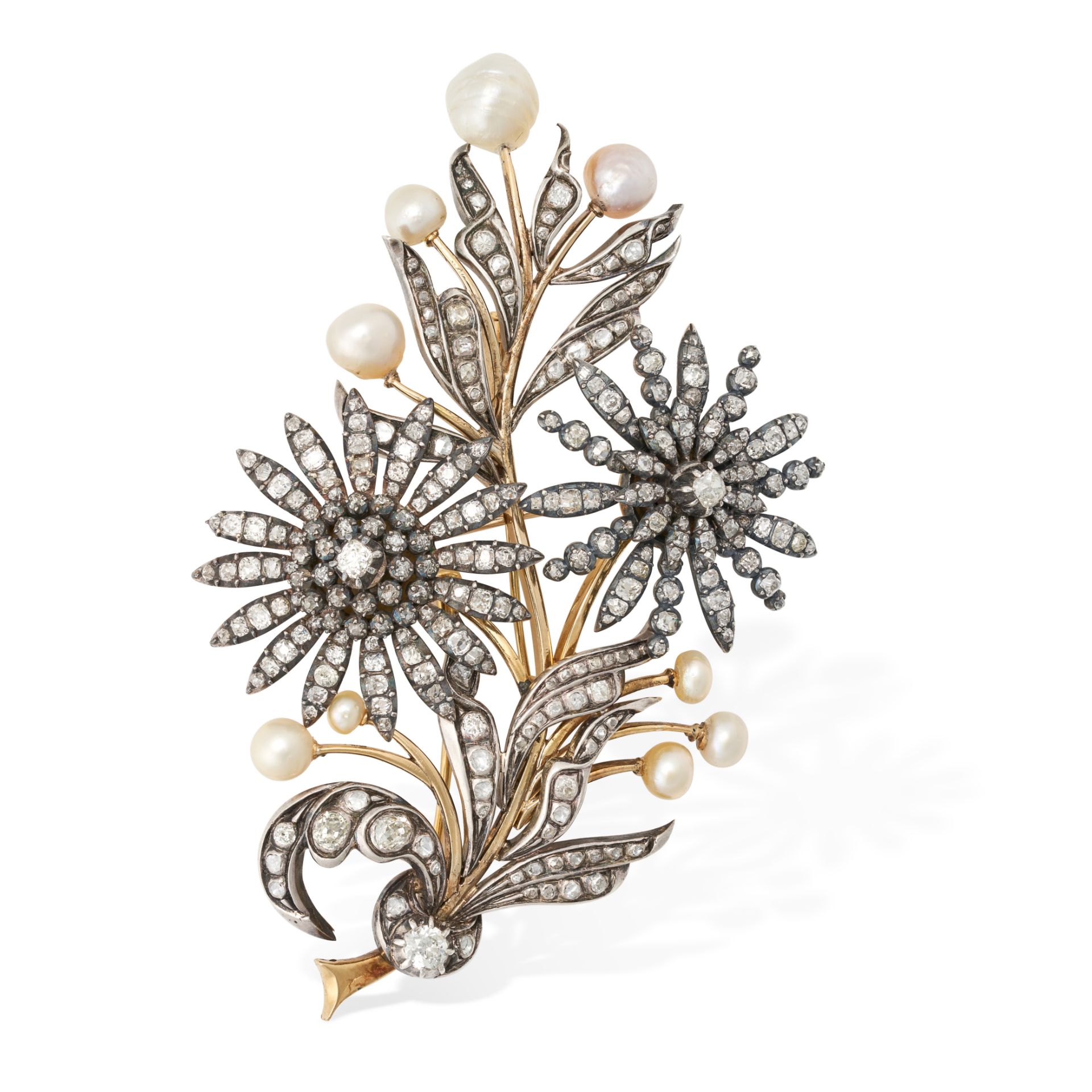 AN ANTIQUE DIAMOND AND PEARL FLORAL SPRAY BROOCH in yellow gold and silver, designed as a spray o...