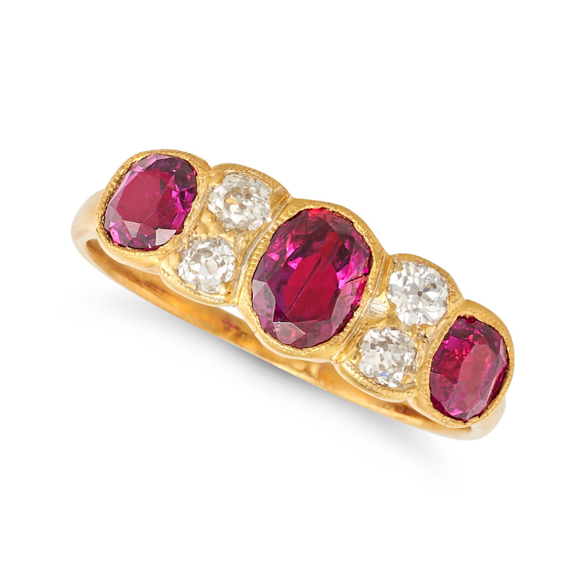 A RUBY AND DIAMOND RING in 18ct yellow gold, set with three oval cut rubies punctuated by pairs o...