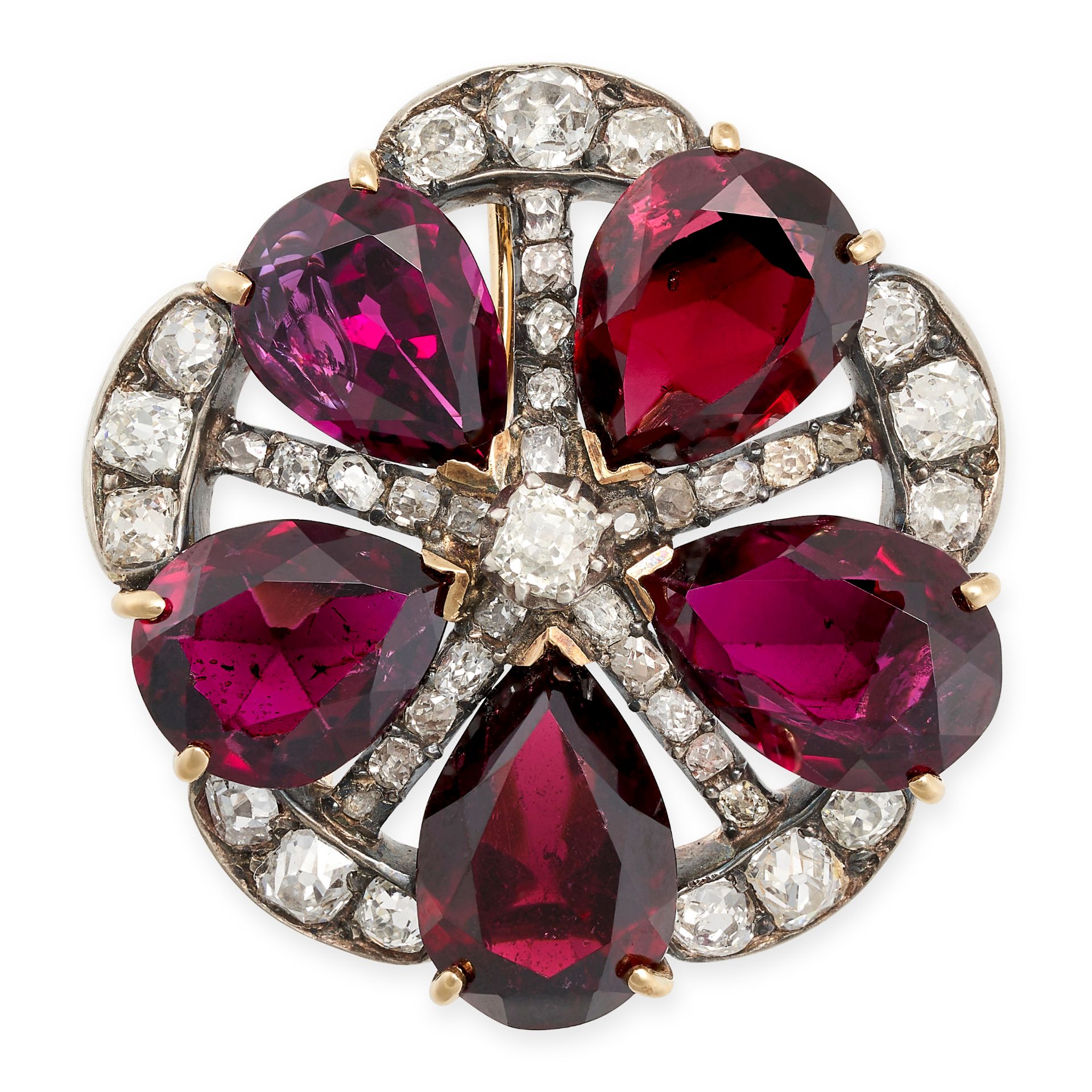 AN ANTIQUE GARNET AND DIAMOND BROOCH in yellow gold and silver, designed as a stylised flower set...