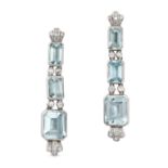 A PAIR OF AQUAMARINE AND DIAMOND DROP EARRINGS in 18ct white gold, each set with three octagonal ...
