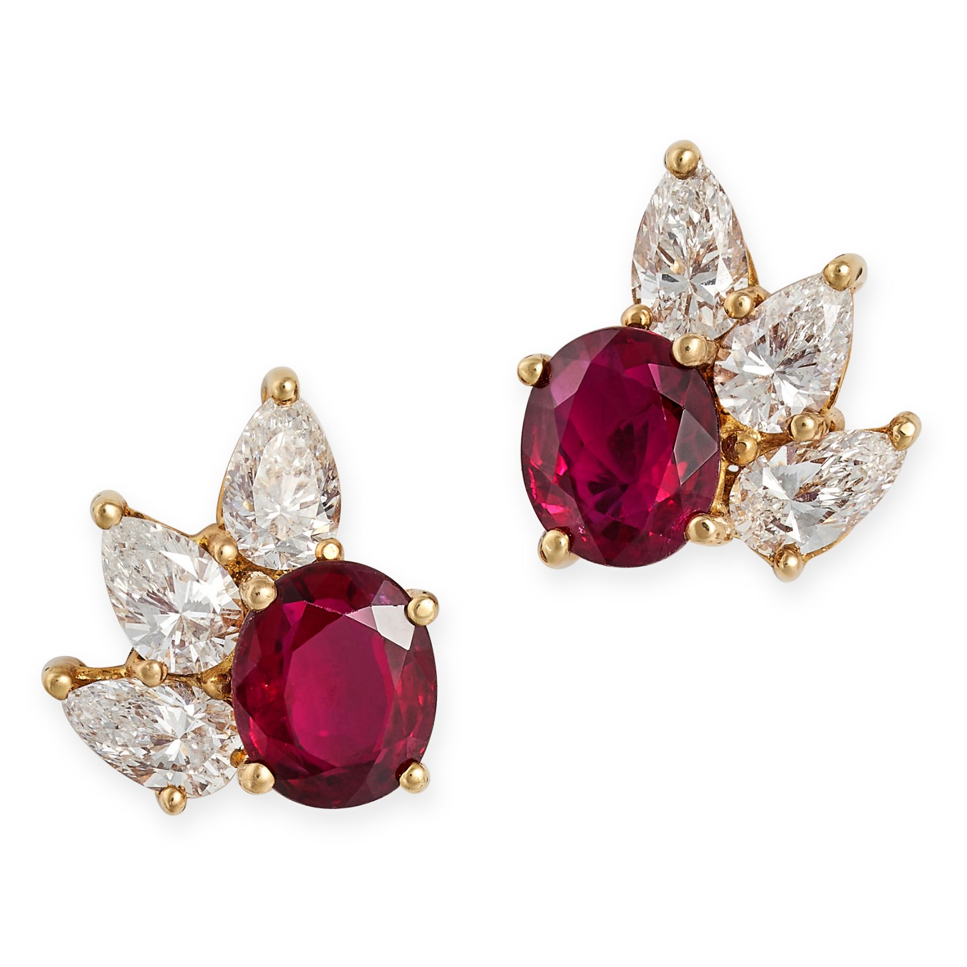 A PAIR OF RUBY AND DIAMOND EARRINGS in 18ct yellow gold, each set with an oval cut ruby accented ...