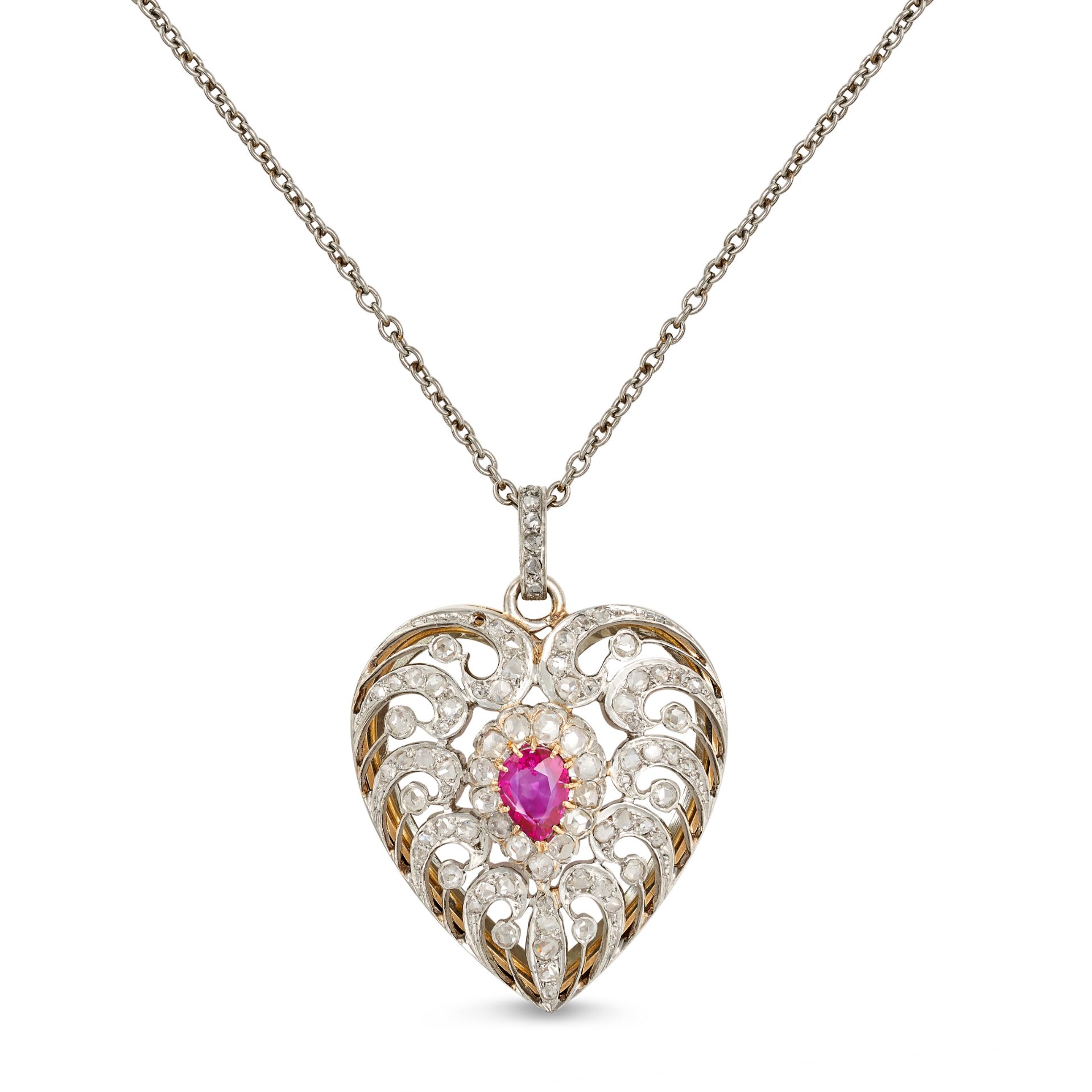 AN ANTIQUE RUBY AND DIAMOND HEART PENDANT NECKLACE designed as an openwork heart set with a pear ...