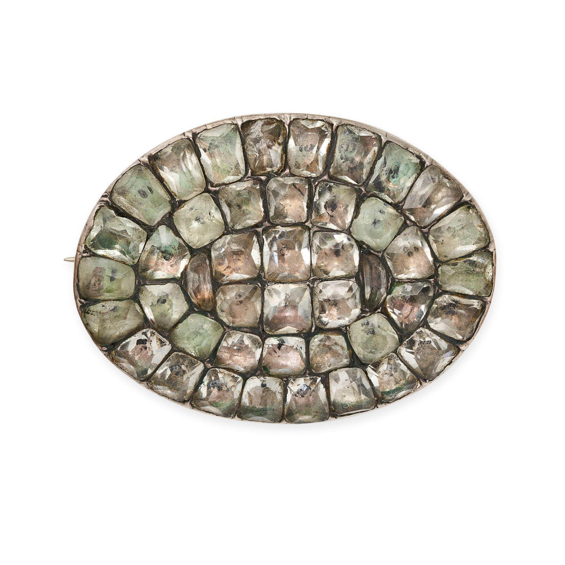 AN ANTIQUE PORTUGUESE CHRYSOLITE BROOCH in silver, the oval body set throughout with calibre cut ...