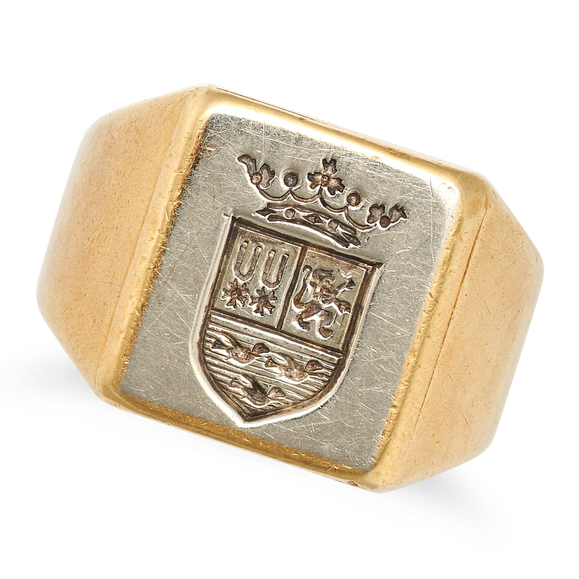 A VINTAGE SIGNET RING in 18ct yellow gold, engraved with a coat of arms surmounted by a crown, st...