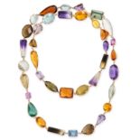 A GEMSET SAUTOIR NECKLACE in 18ct yellow gold, comprising a row of variously cut amethysts, citri...