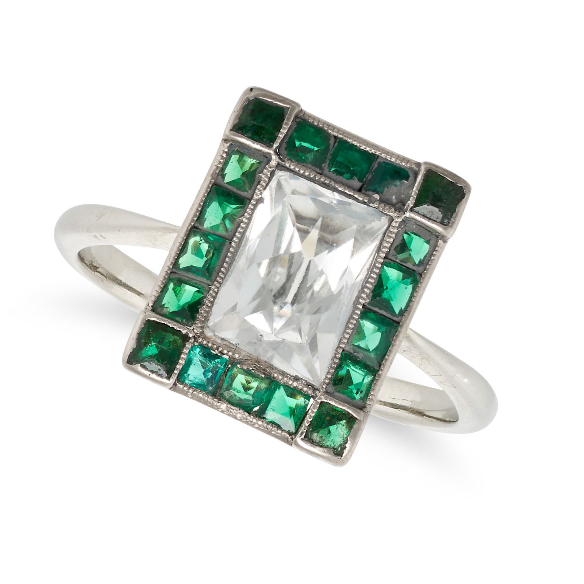 AN VINTAGE GREEN AND COLOURLESS PASTE RING in 18ct white gold, set to the centre with a rectangul...