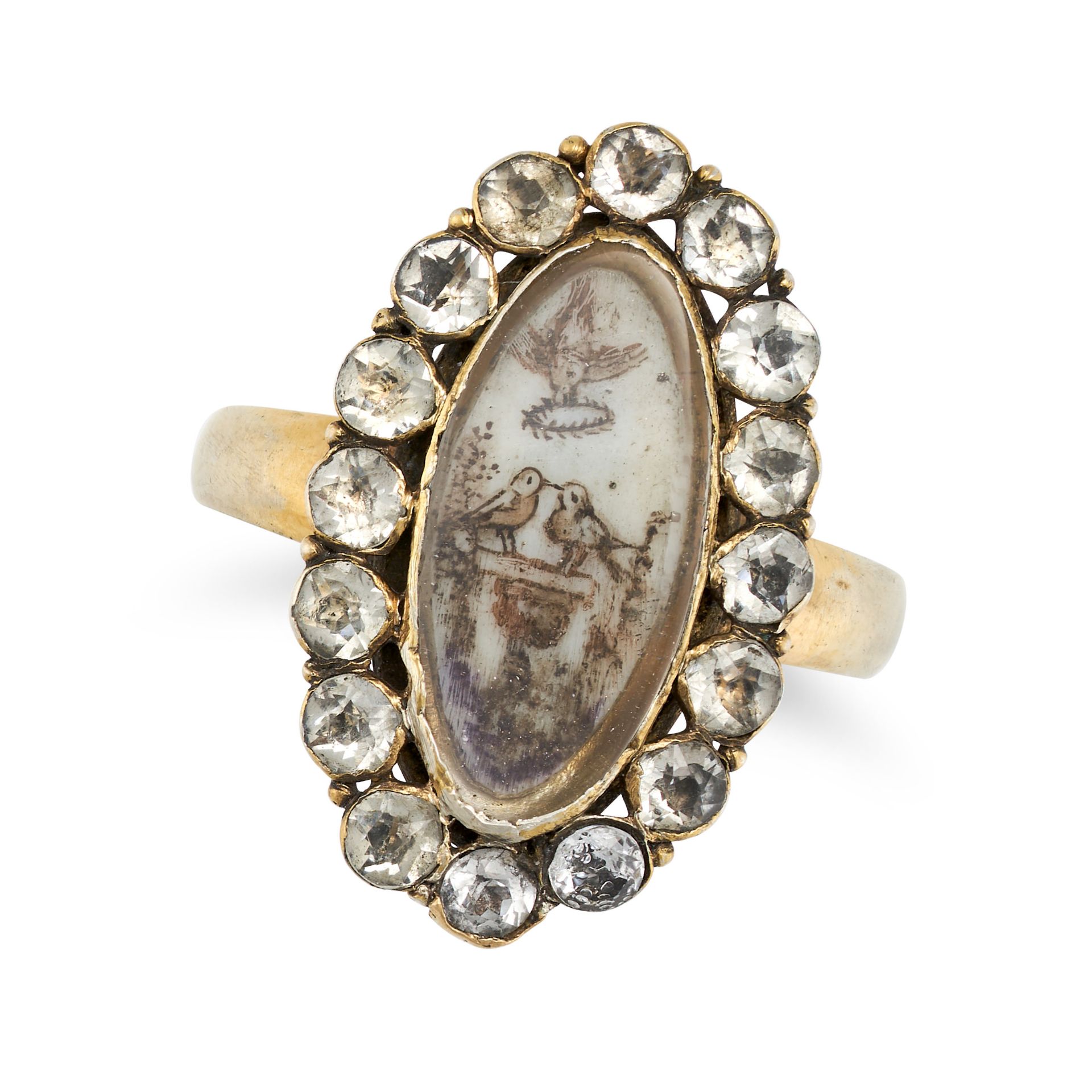 AN ANTIQUE PASTE MOURNING RING the navette shaped face with a painted scene of two birds at a fou...