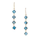 A PAIR OF TOPAZ DROP EARRINGS in 18ct yellow gold, each set with four mixed square cut topaz, sta...
