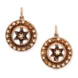 A PAIR OF ANTIQUE PEARL EARRINGS in yellow gold, the circular face with central star motif, set w...