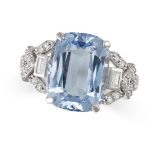 AN AQUAMARINE AND DIAMOND RING in white gold, set with a cushion cut aquamarine of 7.07 carats, t...