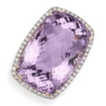 AN AMETHYST AND DIAMOND RING in 14ct yellow gold, set with a fancy mixed cut amethyst of approxim...