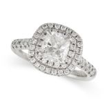 A DIAMOND ENGAGEMENT RING in platinum, set with a cushion cut diamond of 1.02 carat in a double b...