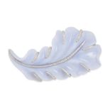 A CHALCEDONY AND DIAMOND FEATHER BROOCH in 18ct white gold, comprising a lilac chalcedony carved ...